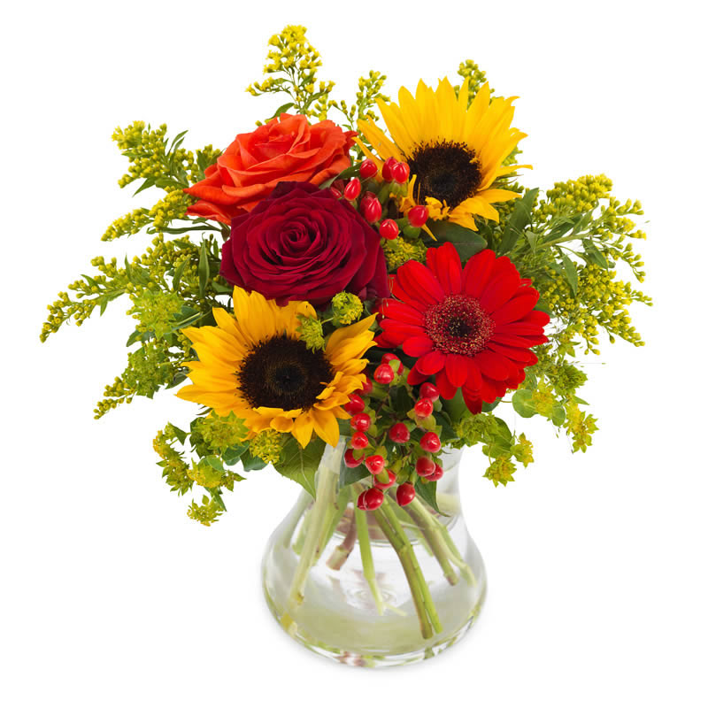 Bukett med bl a röda rosor, röd gerbera och gula solrosor. Beställ blommorna online i Euroflorist webshop, skicka dem med ett blomsterbud!